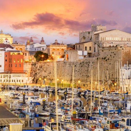 Landscape with Ciutadella de Menorca at twilight time, Minorca island, Spain