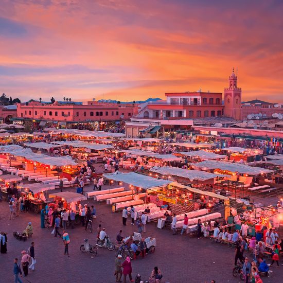Evening on Djemaa El Fna Square with Koutoubia Mosque, Marrakech, Morocco