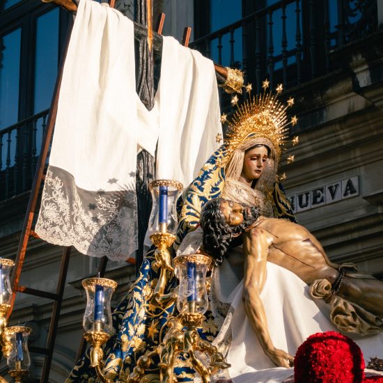 Seville, Spain; September 14th 2024: Statue of the Virgin of Mercy holding the Christ of Mercy from the Brotherhood of Baratillo in Seville. Christian procession in Seville.