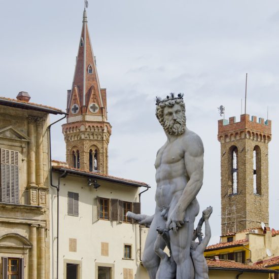 Florence, Italy is known as the birthplace of the Renaissance.  Founded in 80 B.C. by Lucius Cornelius Sulla as a settlement for his soldiers, it was named Fluentia, which later became Firenze.  Renown artists like Michelangelo, Leonardo da Vinci, Botticelli and Donatello all lived, studied and worked in Florence, along with architects like Brunelleschi, who designed the dome of the city's duomo, Cattedrale di Santa Maria del Fiore.  Florence has a colorful history as a political and financial center, dominated for over 150 years by the Medici family and is also known as a fashion center.  Today, it's rich heritage in art can be enjoyed at several galleries and museums including the Uffizi and the Gallerie dell'Accademia, as well as the Pitti Palace (Palazzo Pitti).  Pictured here is the Fountain of Neptune in Piazza della Signoria, with Badia Florintina and the bell tower of Palazzo del Bargello in the background.