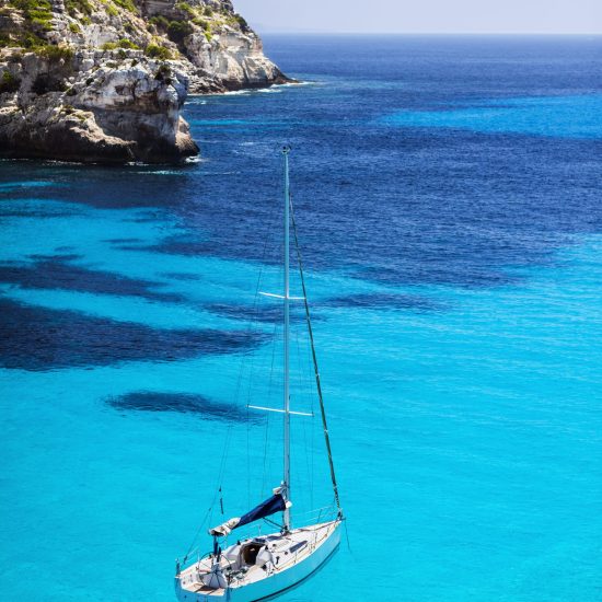 Beautiful bay with sailing boats, Menorca island, Spain